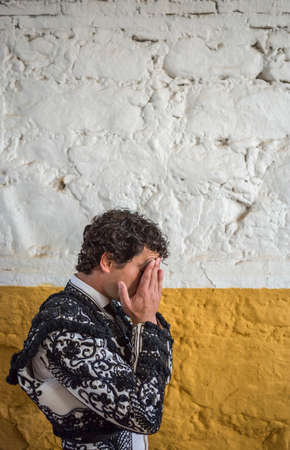 Andujar, SPAIN - September 7, 2014: Spainish bullfighter Miguel Abellan totally focused moments before leaving to fight in Bullring of Andujar, Spainのeditorial素材