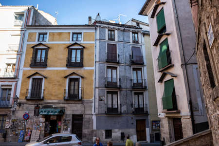 typical houses construction in the old town of the city of Cuenca, fronts painted with living colors, Cuenca, Spainのeditorial素材