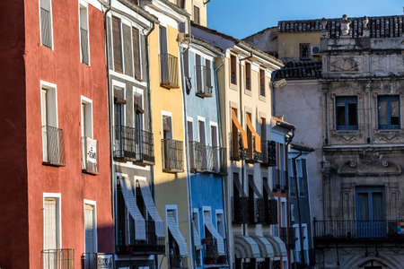 typical houses construction in the old town of the city of Cuenca, fronts painted with living colors, Cuenca, Spainのeditorial素材