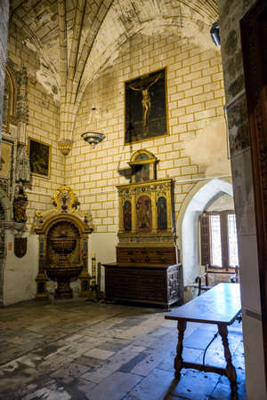 CUENCA, SPAIN - August 24, 2016: Interior of the Cathedral of Cuenca, sacristy entrance of the higher sacristy, the Auld mug in the center left an altar, and on the right a Gothic window, Cuenca, heritage of humanity, Spainのeditorial素材