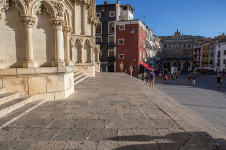 CUENCA, SPAIN - August 24, 2016: Tourists walk near the facade of the Cuenca's Cathedral, The cathedral is dedicated to St Julian, gothic english-norman style, XII century, called the Basilica of Our Lady of Grace, take in Cuenca, Spainのeditorial素材