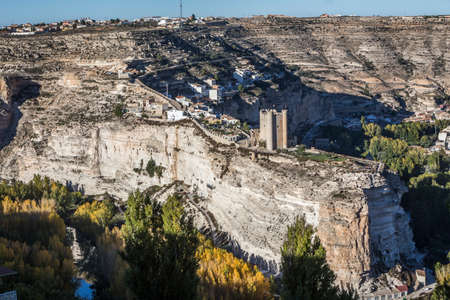 Alcala del Jucar, Spain - October 29, 2016: Panoramic view of the city, on top of limestone mountain is situated Castle of the 12TH century Almohad origin, take in Alcala of the Jucar, Albacete province, Spainのeditorial素材