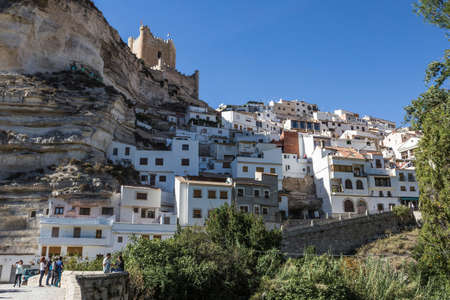 Alcala del Jucar, Spain - October 29, 2016: Roman bridge, located in the central part of the town, to its passage by the river Jucar, at the top of mountain limestone is situated castle of Almohad origin of the century XII, take in Alcala of the Jucar, Alのeditorial素材