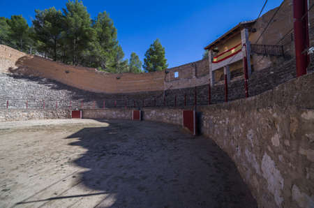 Alcala del Jucar, Spain - October 29, 2016: Ancient bullring, this square is constructed in the shape of ship and byline of the year 1902, next to the banks of the river Jucar, take in Alcala of the Jucar, Albacete province, Spainのeditorial素材