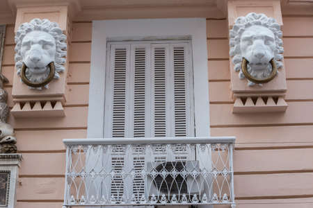 Cadiz Spain- March 31: Detail of balconies and large windows on the time of the nineteenth century, Narrow street with traditional architecture in Cadiz, Andalusia, southern Spainのeditorial素材