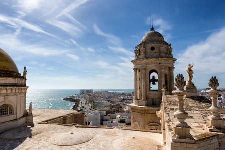 Cadiz Spain- March 31: This bell tower and statues in the roof of the Cathedral of Cadiz, completed in the nineteenth century is located very close to the sea, take in Cadiz, Andalusia, Spain Western Europeのeditorial素材