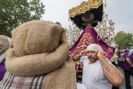 Group of costaleros during a procession of holy week, Andalucia, Spainのeditorial素材