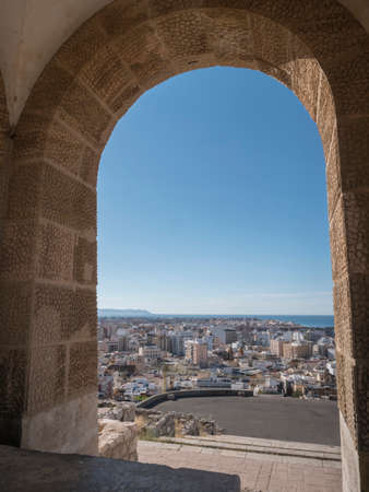 Almeria, SPAIN - May 20: Medieval moorish fortress Alcazaba in Almeria, Eastern tip is the bastion of the outgoing, Almohade Arch of South Tower, overview of the city, take in Almeria, Andalusia, Spainの写真素材