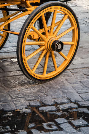 Detail of wheels of typical chariot in Sevilleの写真素材
