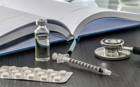 Stethoscope On A Medicine Book, Conceptual Imageの写真素材