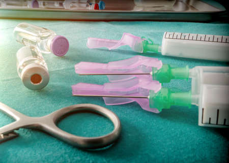 Several Vials And Syringe In Laboratory, Conceptual Image