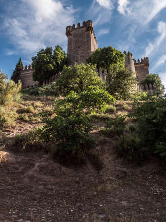 Almodovar del Rio, Cordoba, Spain - June 9, 2018: It is a fortitude of Moslem origin, it was a Roman fort and the current building has definitely origin Berber, of the year 760, Between the year 1901 and 1936 was restored by its owner, Rafael Desmaissiereのeditorial素材