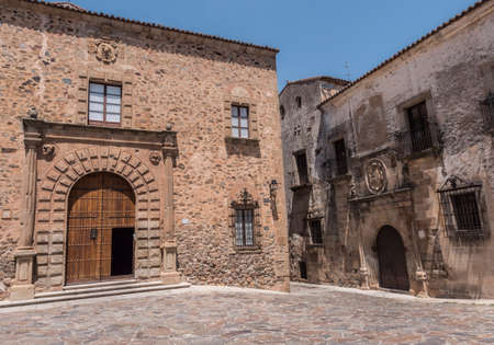 Caceres, Spain - july 13, 2018: Episcopal Palace located in Plaza Santa Maria, main faÃ§ade, Renaissance style, has a half-point arch pontoon adorned by a double row of ashlars, Caceres, Spainのeditorial素材