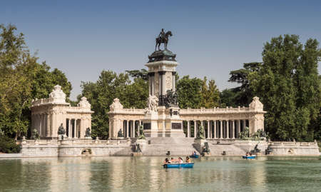 Madrid, Spain - August 3 2018: Parque del Buen Retiro, one of the main tourist attractions of the city, was built in the first half of the XVII century, the highlights are the Monument to Alfonso XII, Madrid, Spainのeditorial素材