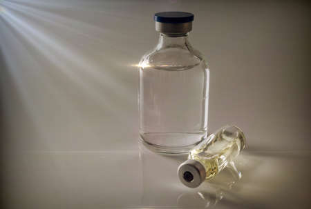 Several vials isolated on white background, conceptual image