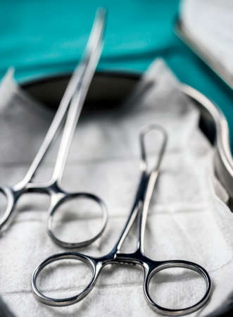 Some scissors for surgery on an operating theater, conceptual image, vertical compositionの写真素材