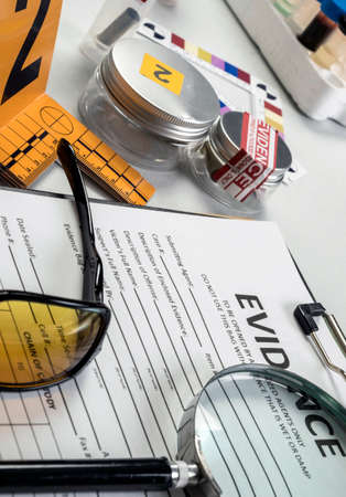 Various laboratory evidence forensic equipment, conceptual image