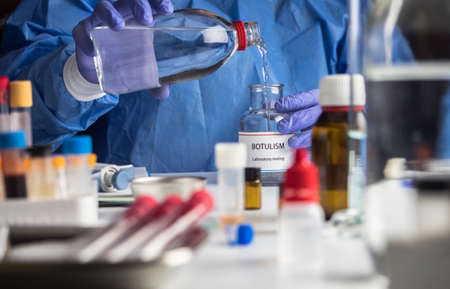 Specialist analyzes botulism Samples in laboratory, conceptual image
