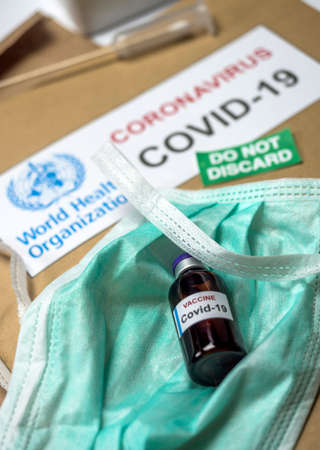 Coronavirus vaccine on a OMS dossier, conceptual image