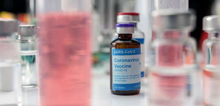 Coronavirus covid-19 experimental vaccine in a laboratory, conceptual imageの写真素材