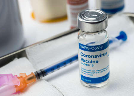 Coronavirus covid-19 experimental vaccine in a laboratory, conceptual imageの素材 [FY310151317424]