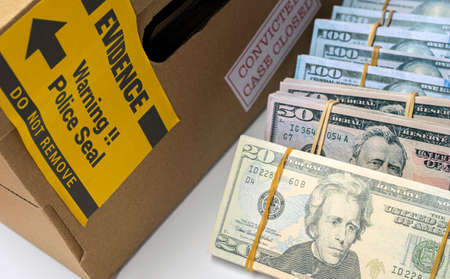 dollar bills in criminal investigation unit, conceptual imageの写真素材
