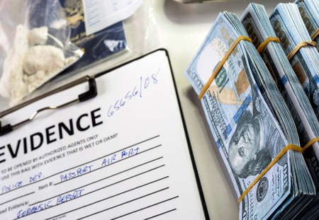 dollar bills in criminal investigation unit, conceptual imageの写真素材