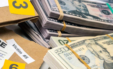 dollar bills in criminal investigation unit, conceptual image