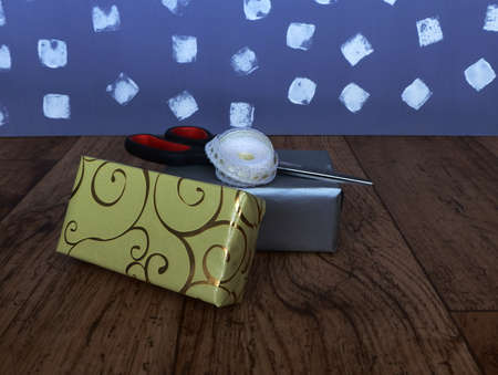 presents waiting to be tied with a white ribbonの写真素材