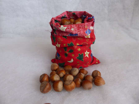 christmas bag full of hazelnutsの写真素材