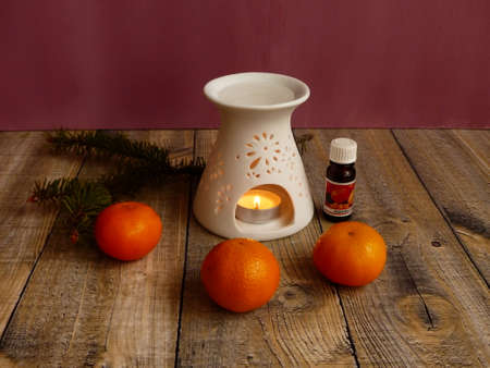 aroma lamp and tangerines for holiday moments of relaxationの写真素材