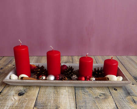 advent candlestick with red candlesの写真素材
