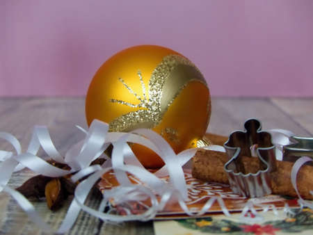 yellow christmas balls and white bowsの写真素材