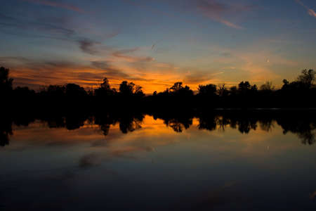 Reflection of a beautiful sunsetの写真素材