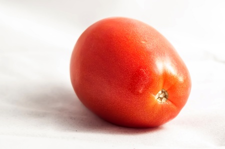 red Tomato isolated on white background の写真素材