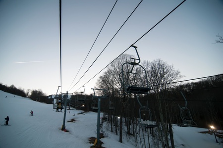 views from a ski lift during vacation on sunny dayの写真素材