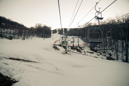 views from a ski lift during vacation on sunny dayの写真素材