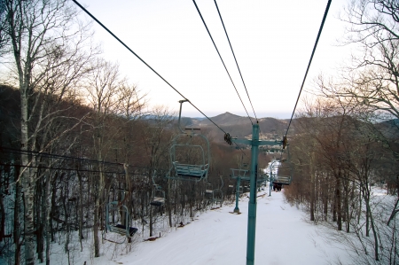 views from a ski lift during vacation on sunny dayの写真素材