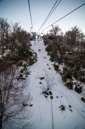 views from a ski lift during vacation on sunny dayの写真素材