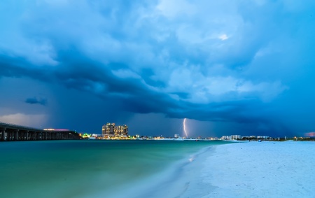 stormy thunder and lightning clouds over destin floridaの写真素材