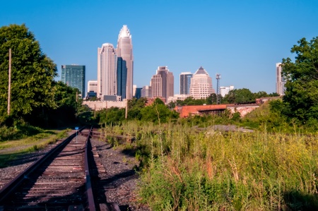 charlotte city skyline in daylight with carolina blue skyの写真素材