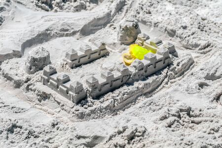 sand castle structures built at seashore beachの写真素材