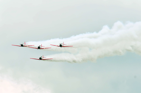 airplanes at airshow on a cloudy dayのeditorial素材