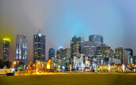 view of charlotte skyline at night near romare bearden parkの写真素材