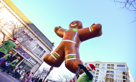 ginger bread cookie inflatable floating thru city streets at thanksgiving paradeのeditorial素材