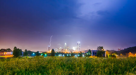 lightning and thunderstorm over city of charlotteの写真素材