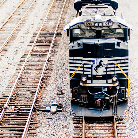 slow moving Coal wagons on railway tracksのeditorial素材