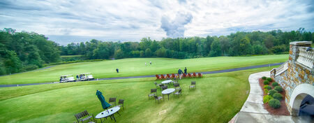 luxurious golf course on a cloudy dayの写真素材