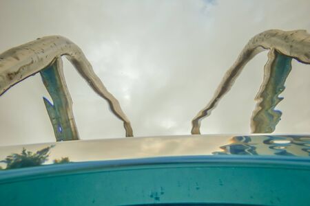 relaxing at the swimming poolの写真素材