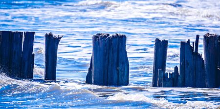 broken pier at folly beach scの写真素材
